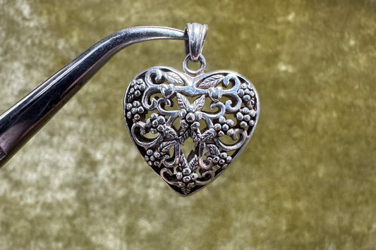 Hollow Flower Heart Pendant