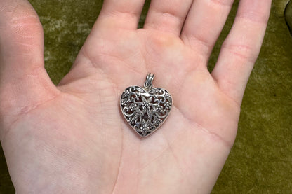 Hollow Flower Heart Pendant